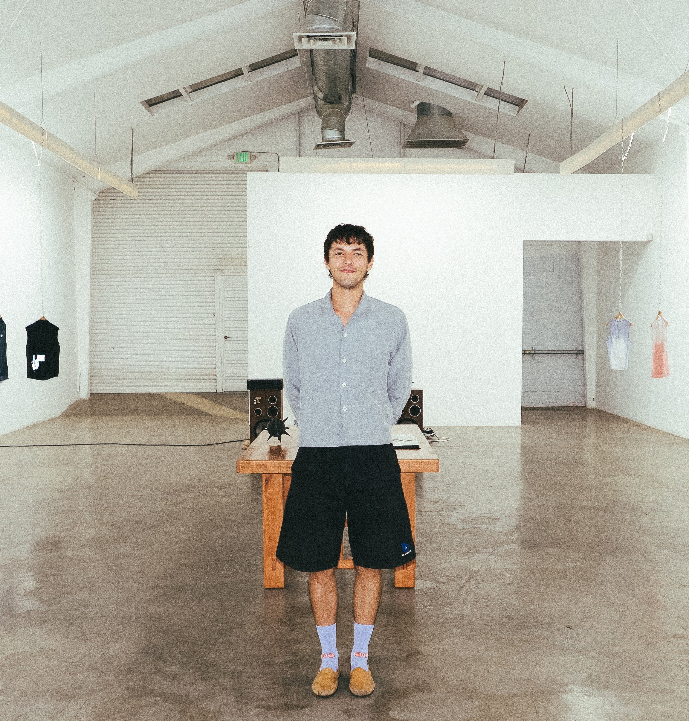 Dani Noguera stands in store