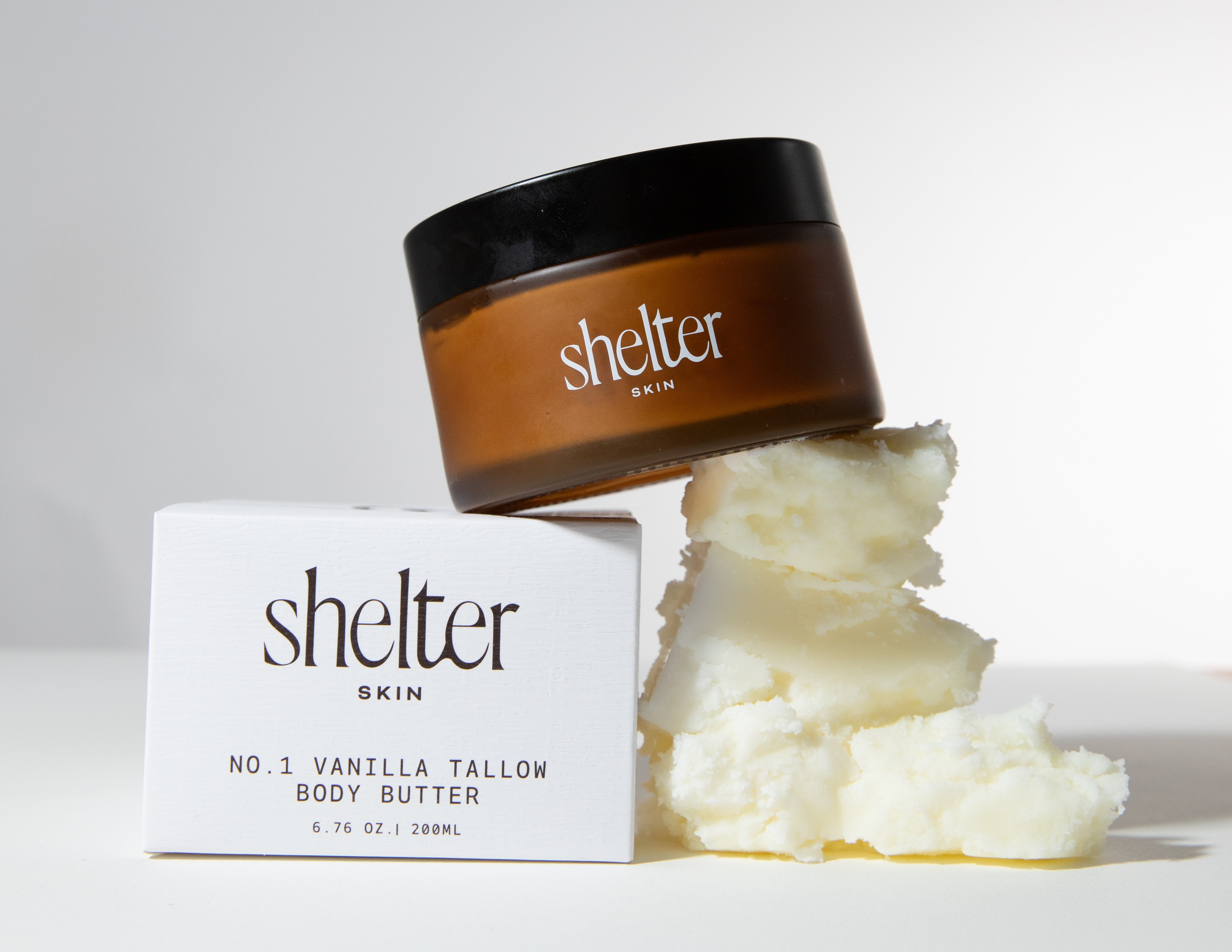 Shelter Skin body butter jar and box on display
